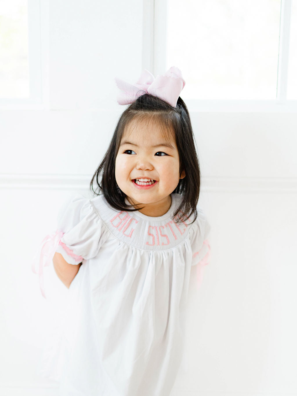 Pink big sister hand smocked dress