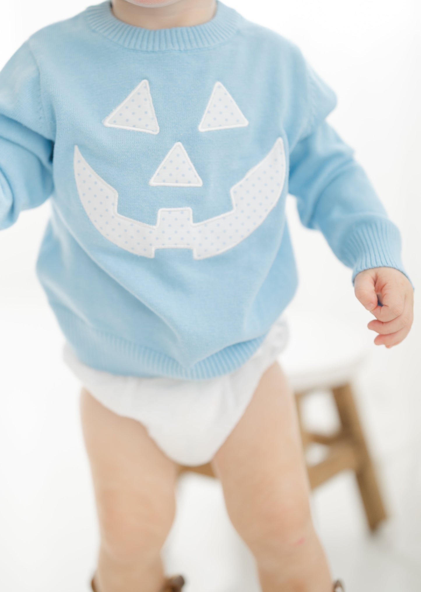 Pumpkin appliqué sweater