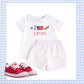 Red, white, and blue Swiss Dot short set