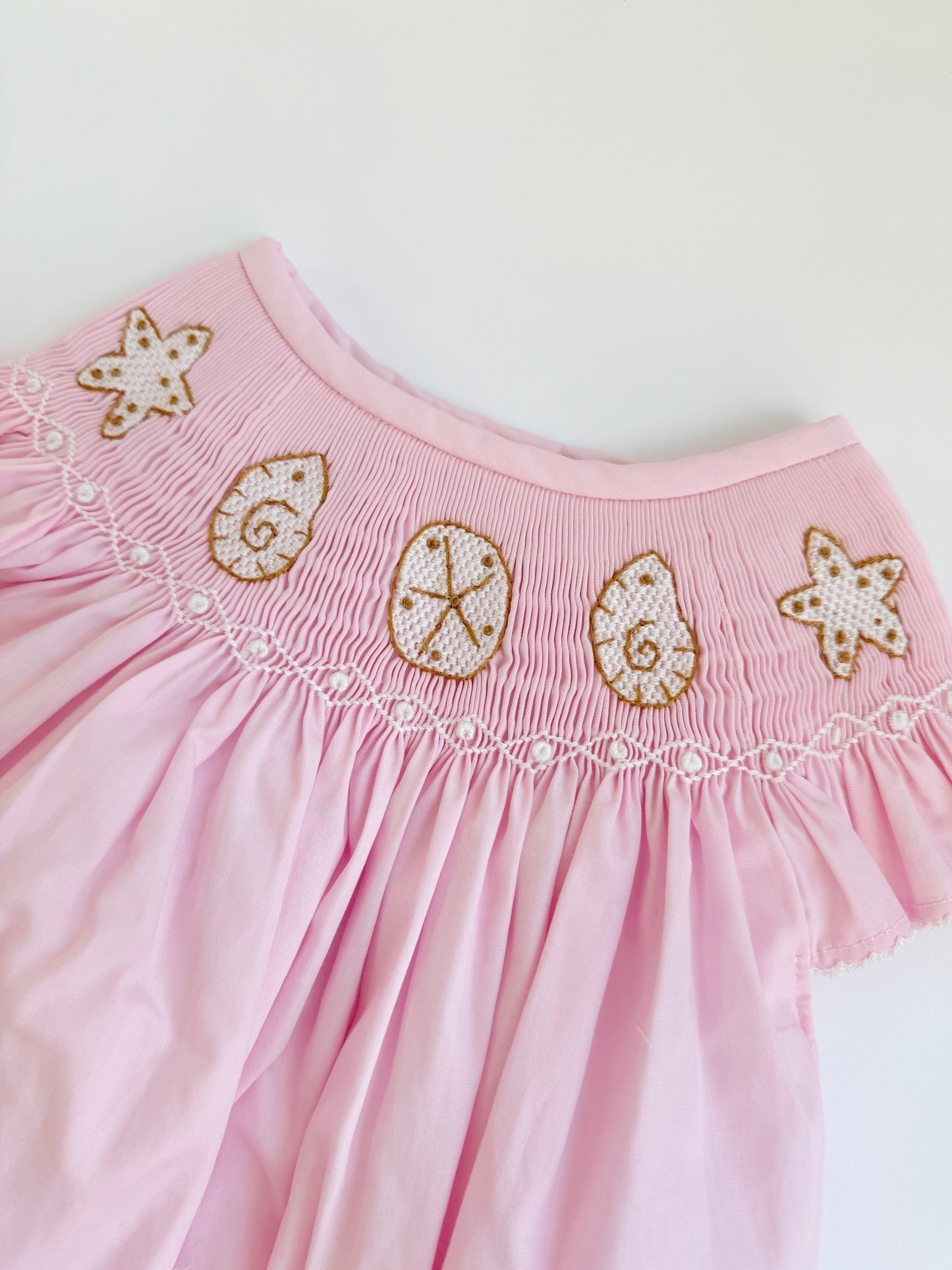 Pink smocked shell bubble